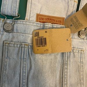 Womens new with tags size medium Levi overalls